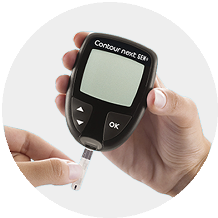 user inserting a strip in a meter